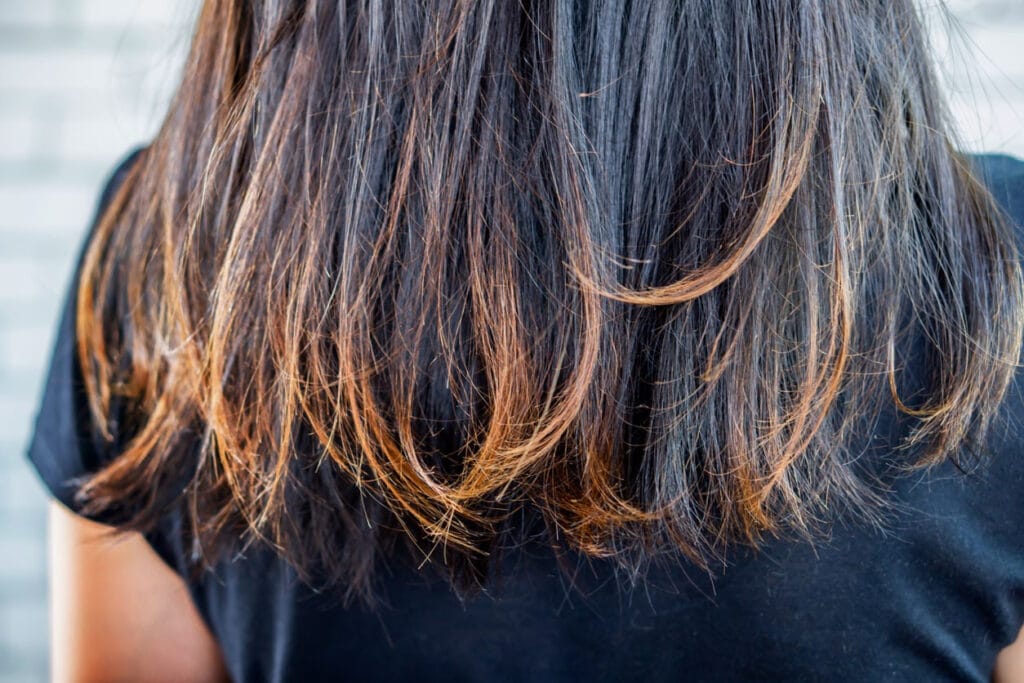 wanita mempunyai rambut rusak